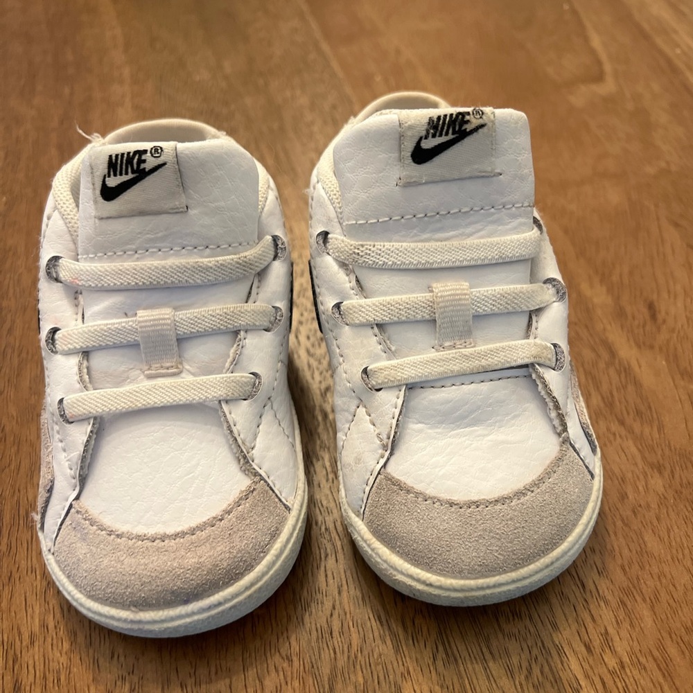 Toddler size 4C slip on Nikes sneakers.